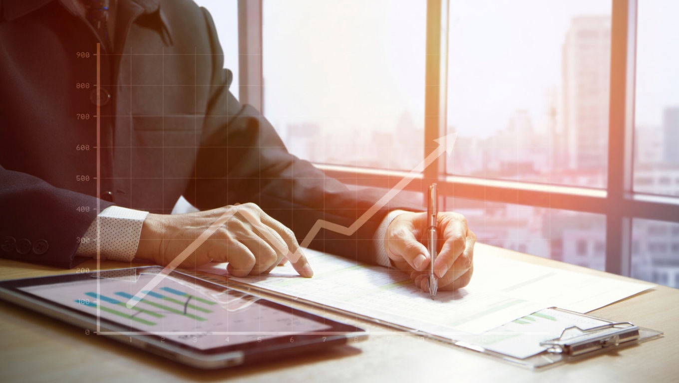 Merchant reviewing payment processing costs