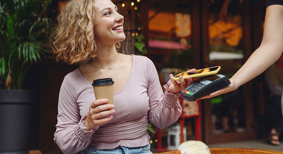 Customer making a digital wallet transaction at checkout